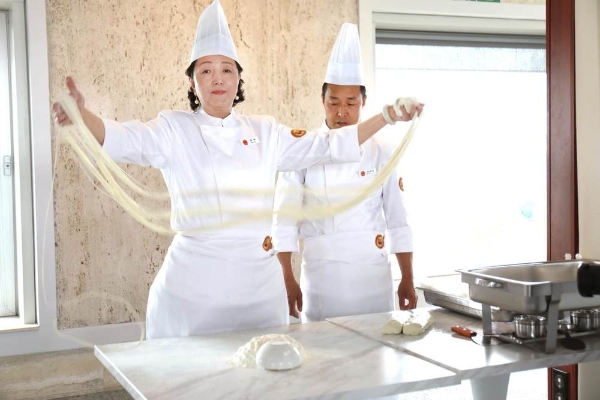 西部马华餐饮集团走进联合国