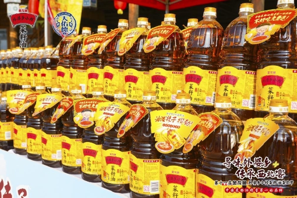 云卷青稞碧，日照菜花金，金龙鱼外婆乡小榨菜籽油菜花节带你闯入油画版夏日梦境 